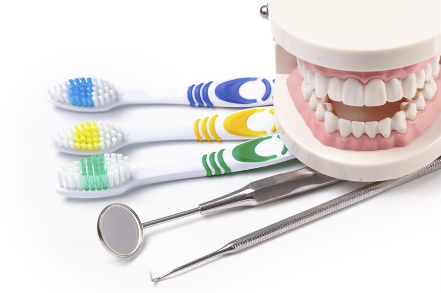 Images of dental hygiene materials like toothbrushes